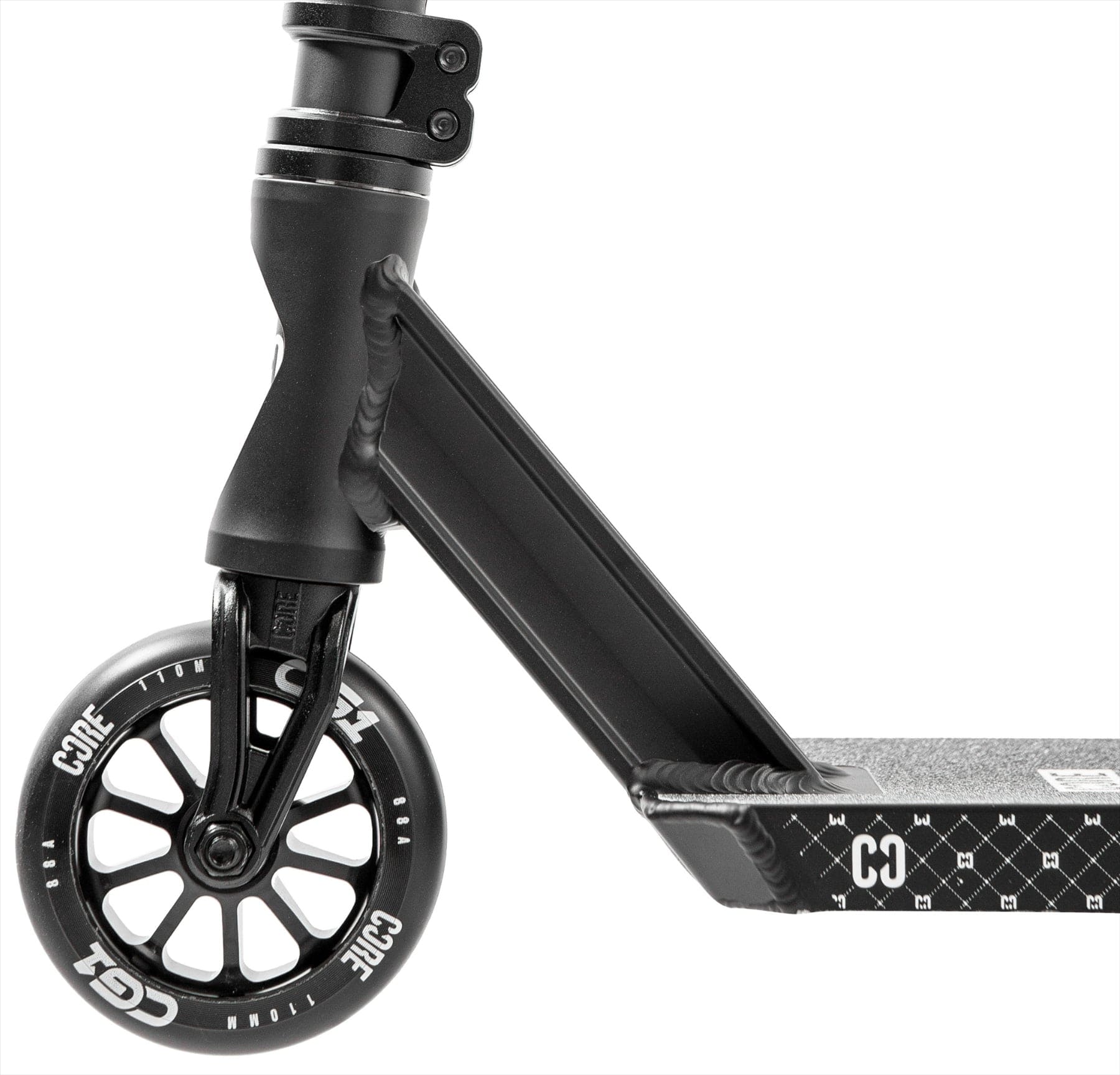 Close-up of the CORE CG1 Complete Stunt Scooter - Black by CORE, highlighting the textured diamond-patterned deck, sturdy fork, and wheel featuring "CORE" in white letters.