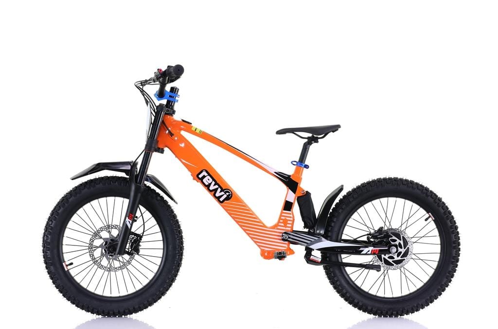 The Revvi 20" Kids Electric Balance Bike in orange features off-road rubber tires, black handlebars, and a blue saddle. With a robust frame, hydraulic disc brakes, and front/rear suspension, it's ideal for tackling rough terrain.