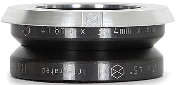 A close-up of the Native Halo Integrated Stunt Scooter Headset - Raw by Native, featuring engraved "41.8mm x 30.4mm x 8mm" measurements, a geometric logo, black body with silver top edge, and SCS setup compatibility.