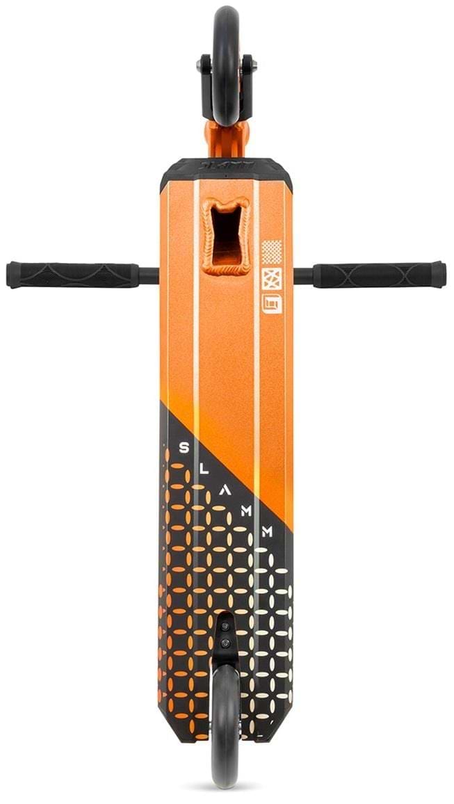 The Slamm Assault Complete Stunt Scooter in orange features a geometric pattern with black, horizontal handle grips, vertical stripes, and dotted designs. Its aluminum wheels are perfectly aligned for skill enhancement.