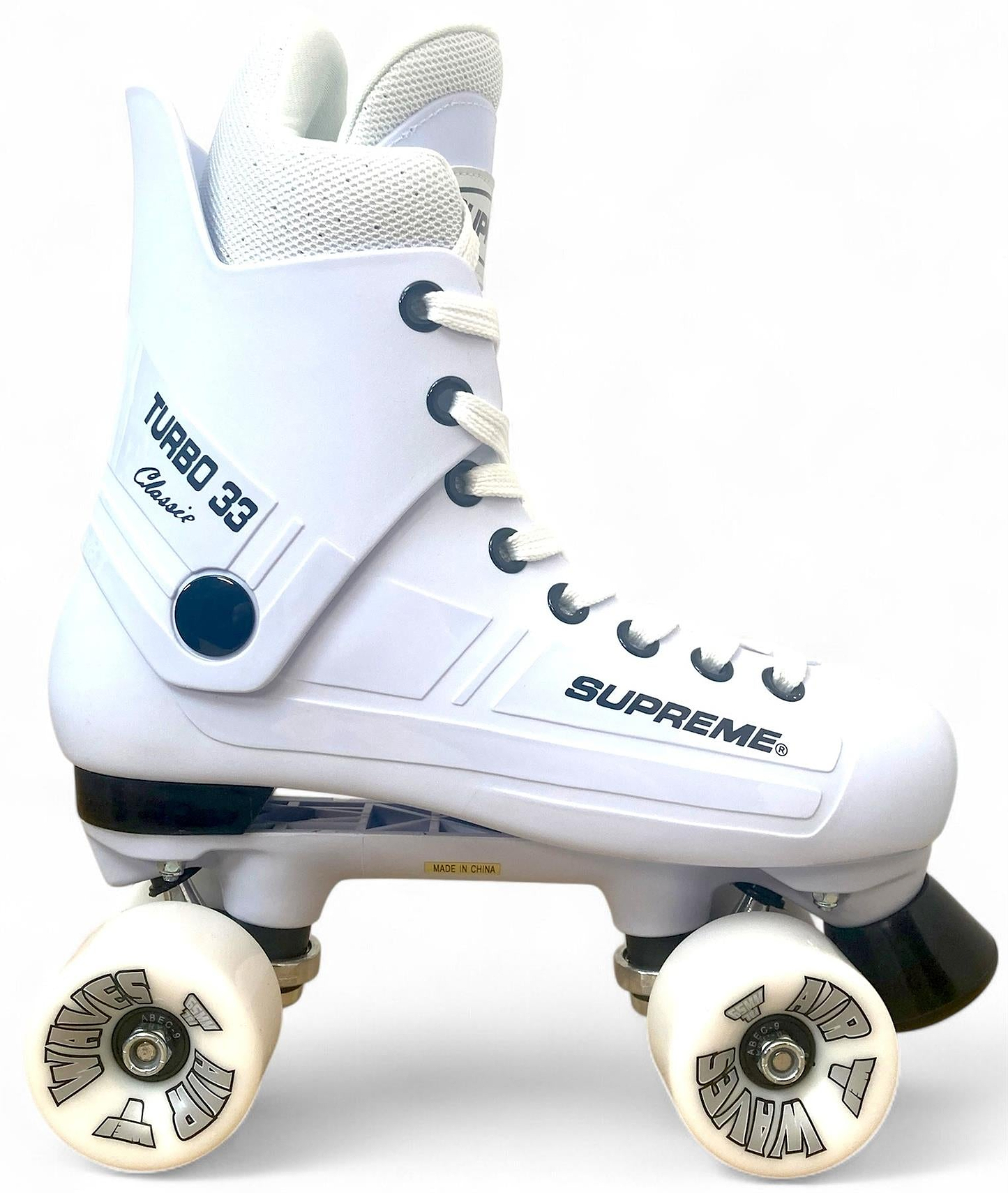 The Supreme Turbo 33 Nylon Quad Roller Skates in white feature white wheels, black accents, a high ankle cuff, white laces, and are branded "Supreme" for style and support.