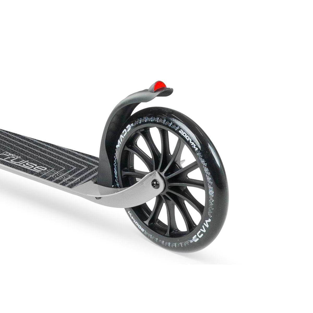 Close-up of the rear wheel of the Madd Gear Metro Cruise 250 Foldable Commuter Scooter by MGP, showing its large black tire with white text, black spokes, grey metal frame, rear fender, and a small red reflector.