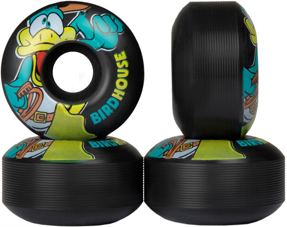 Four Birdhouse Duck Jones 52mm 99A skateboard wheels by Birdhouse are shown in black, crafted from Super High Rebound urethane. Each wheel displays a vibrant cartoon duck with a yellow beak and blue clothes alongside the “BIRDHOUSE” logo printed on the side. In the display, two wheels stand upright, one rests on its side, and another reveals its inside edge.