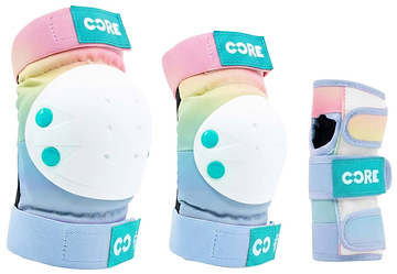 The CORE Junior Triple Skate Protection Pad Set - Pop includes pastel-colored knee/elbow pads with white hard shells and a wrist guard, all with teal patches featuring the “CORE” label.