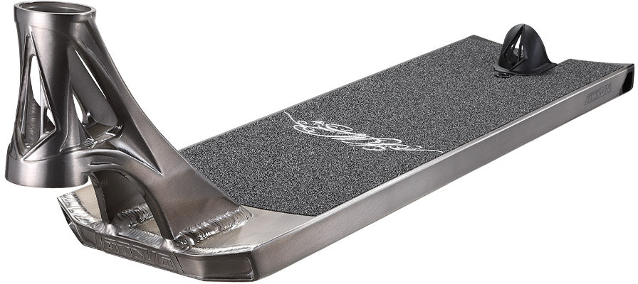 A close-up of the Blunt Envy AOS V6 Kai Martin Signature Stunt Scooter Deck (6.5″ x 23″) showcases its rough black grip surface and detailed welding, captured from a low angle.