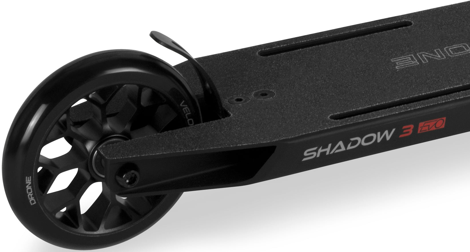 Close-up of a black Drone Shadow 3 Evo Complete Stunt Scooter deck and rear wheel, with the text “SHADOW 3 EVO” printed on the side.