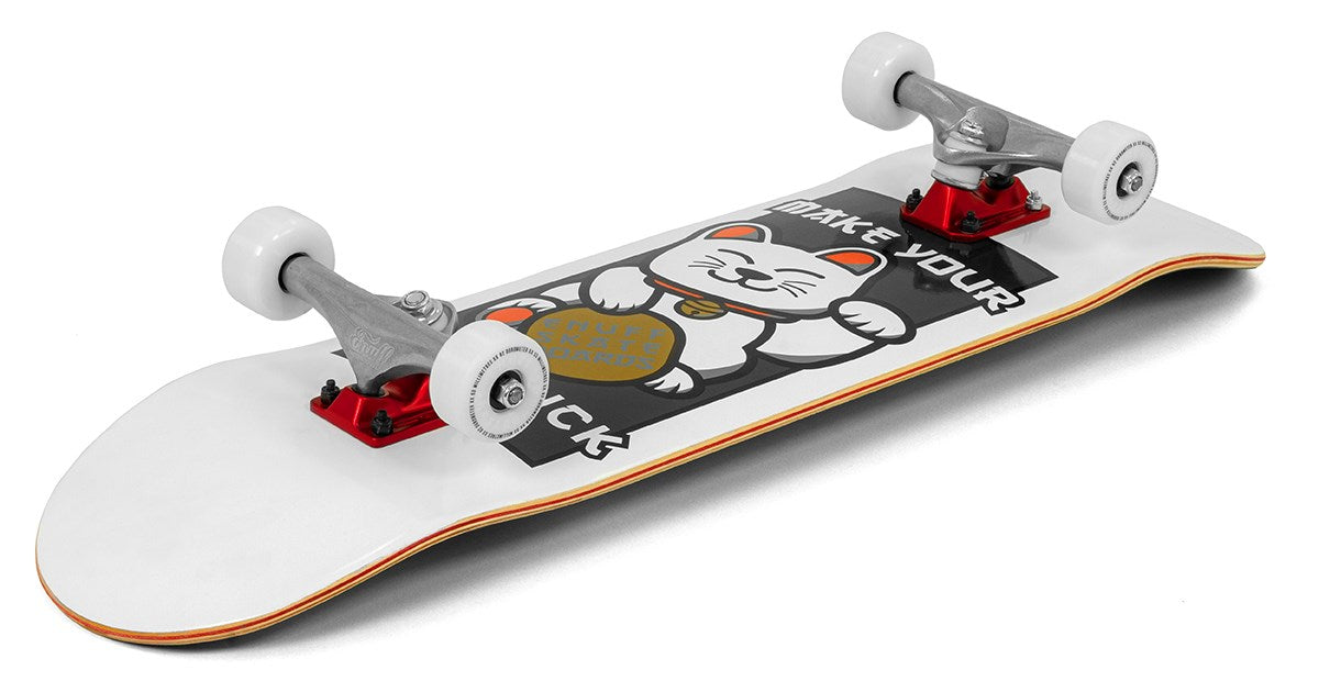 The Enuff Lucky Cat White Complete Skateboard - 8″ x 32″ features a deck with a waving lucky cat design and the phrase “MAKE YOUR” above it, complemented by white wheels and striking red trucks. Perfect for beginner skateboarders interested in street and park skating, this complete skateboard comes from the trusted Enuff brand.