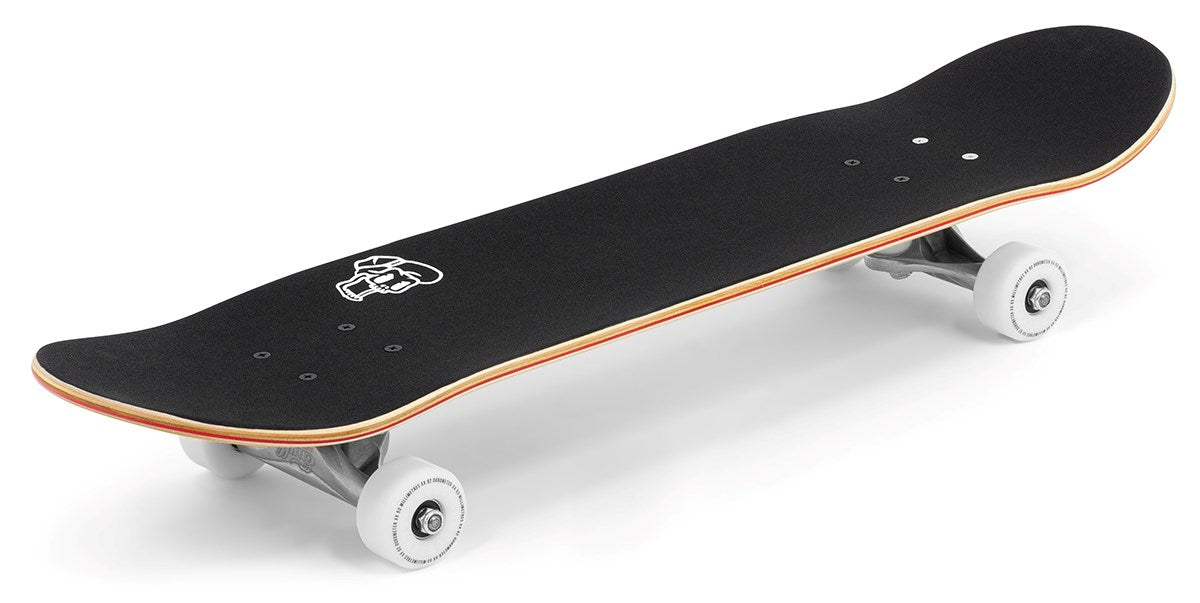 An Enuff Lucky Cat White Complete Skateboard (8″ x 32″) is shown on a white background. The skateboard features a striking white skull graphic near the front of its deck, complemented by silver trucks and white wheels, making it an ideal choice for street and park skating or for beginners looking for a reliable option from Enuff.