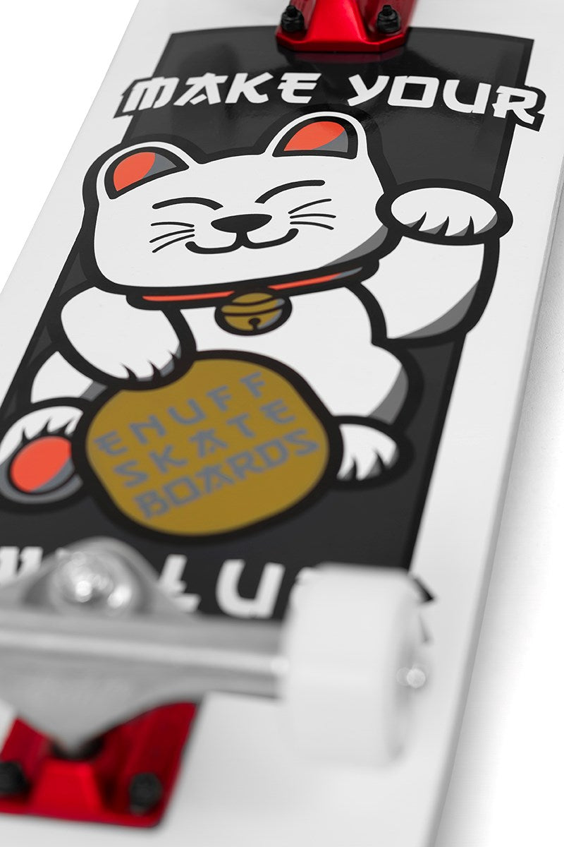 Close-up of the Enuff Lucky Cat White Complete Skateboard - 8″ x 32″ by Enuff, featuring a lucky cat illustration holding a gold coin inscribed with “ENUFF SKATE BOARDS,” and the text “MAKE YOUR” above. Ideal for beginner skateboarders and suitable for both street and park skating, this deck displays striking red and black accents on a white background.