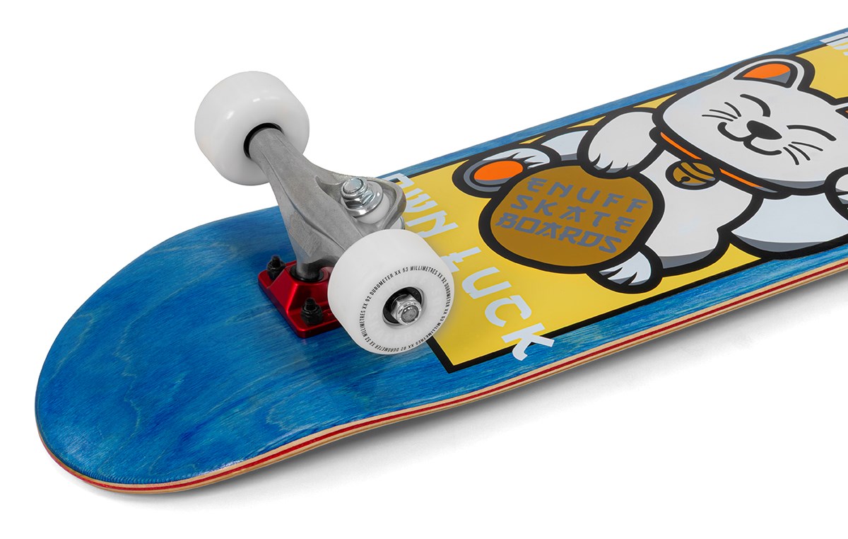The Enuff Lucky Cat Mini Blue Complete Skateboard - 7.25″ x 29.5″ features a vibrant blue deck showcasing a lucky cat graphic holding a coin, with “Good Luck” and “Enuff Skateboards” printed on the deck. Outfitted with white wheels and silver trucks, this beginner skateboard from Enuff is an ideal mini skateboard for kids who are ready to start their skateboarding journey.