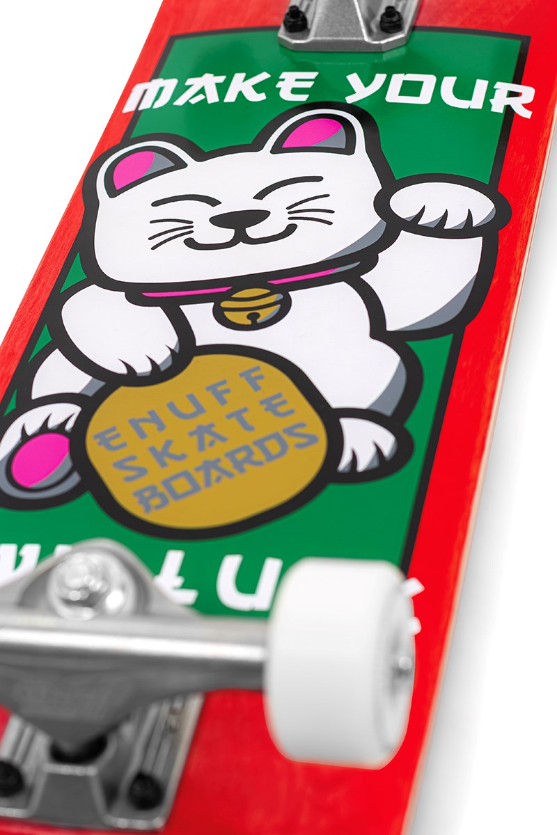 The Enuff Lucky Cat Mini Red Complete Skateboard (7.25" x 29.5") is a beginner board for kids featuring red edges, a green center, and a cartoon lucky cat holding a gold coin with “ENUFF SKATE BOARDS” and “MAKE YOUR” above.