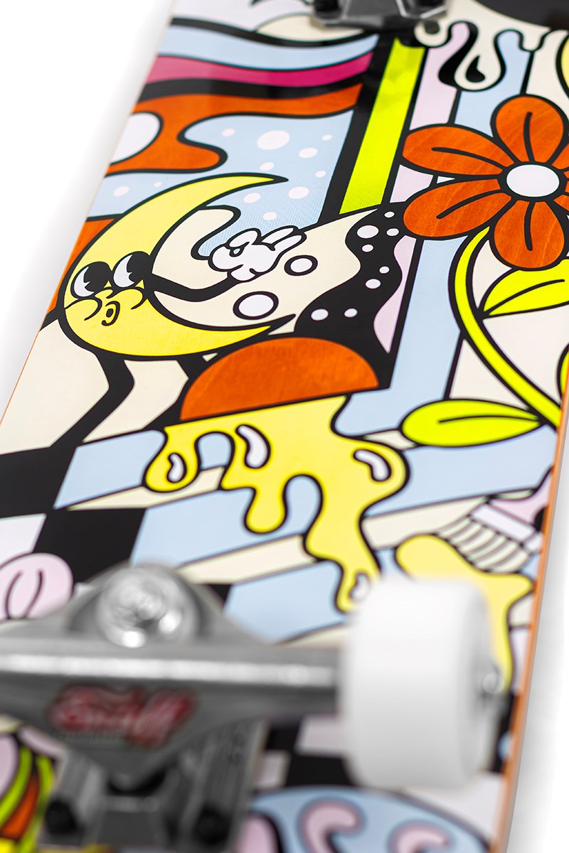 Close-up of the Enuff Meltworld Dazed Complete Skateboard (7.75" x 31.5") by Enuff, featuring a colorful abstract design with bold black lines, an orange flower, and yellow accents on a maple deck—perfect for beginner skateboarders.