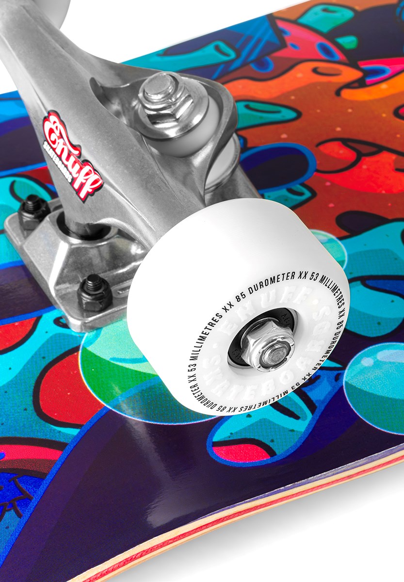 Close-up of an Enuff Lost At Sea Goldfish Complete Skateboard's wheel and truck, highlighting the colorful cartoon-style graphic on its 8.0" x 32.0" deck—ideal for beginner riders. Brand: Enuff.