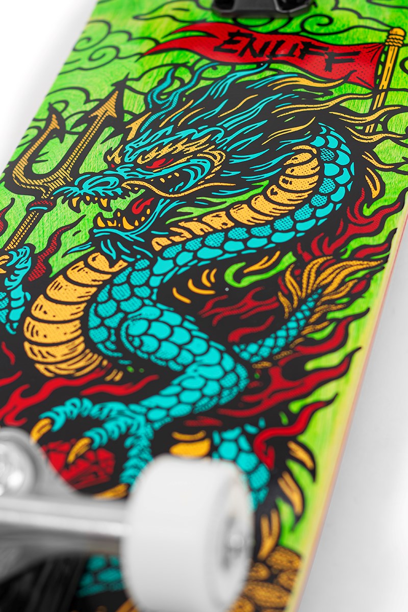 Close-up of the Enuff Yokai Dragon Complete Skateboard (8.25" x 32.1") by Enuff, showing its vibrant Japanese dragon artwork with red flames and a red flag logo, plus partially visible white wheels.