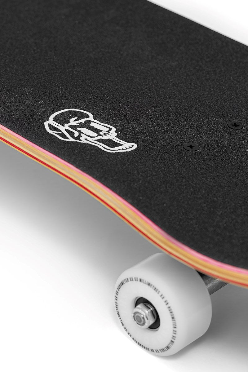 Close-up of the Enuff Yokai Kitsune Complete Skateboard (8.25" x 32.1"), featuring a 7-ply maple deck with black grip tape, white wheels, colored edge layers, and folklore-inspired art in the style of Enuff's Japanese Yokai designs.