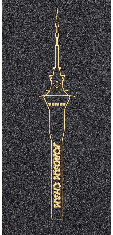 A black background features a gold line illustration of a tall tower inspired by the sleek design of a Blunt Envy scooter. The vertical text “JORDAN CHAN” appears on the tower, echoing the premium style of the Blunt Envy AOSV6 Stunt Scooter Griptape – Jordan Chan Signature.