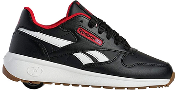 Heelys x Reebok Classic Boys Shoes in black with a white side stripe, red trim, and a thick white sole featuring a wheel in the heel.