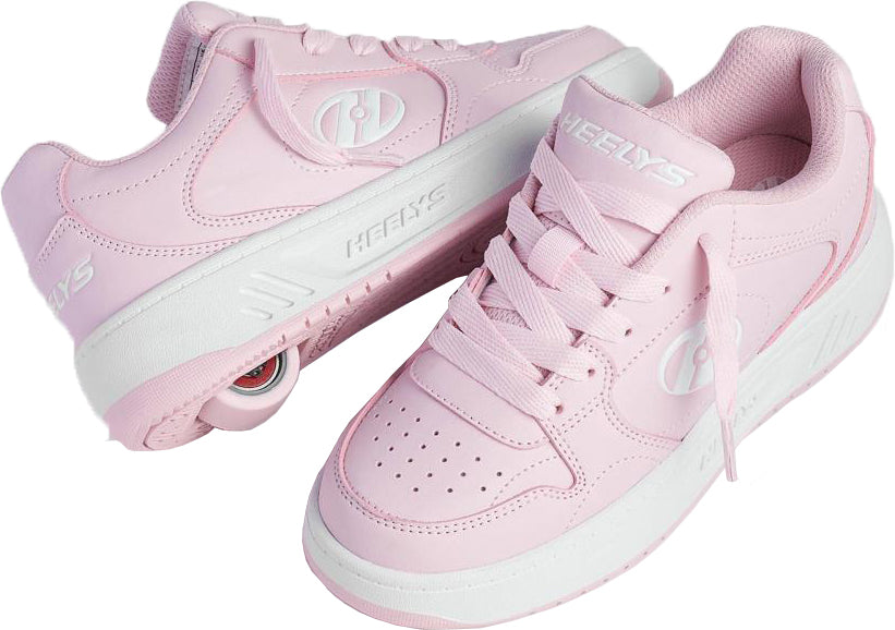 Pair of light pink and white court-style Heelys Gio Girls Shoes with a wheel embedded in each heel.