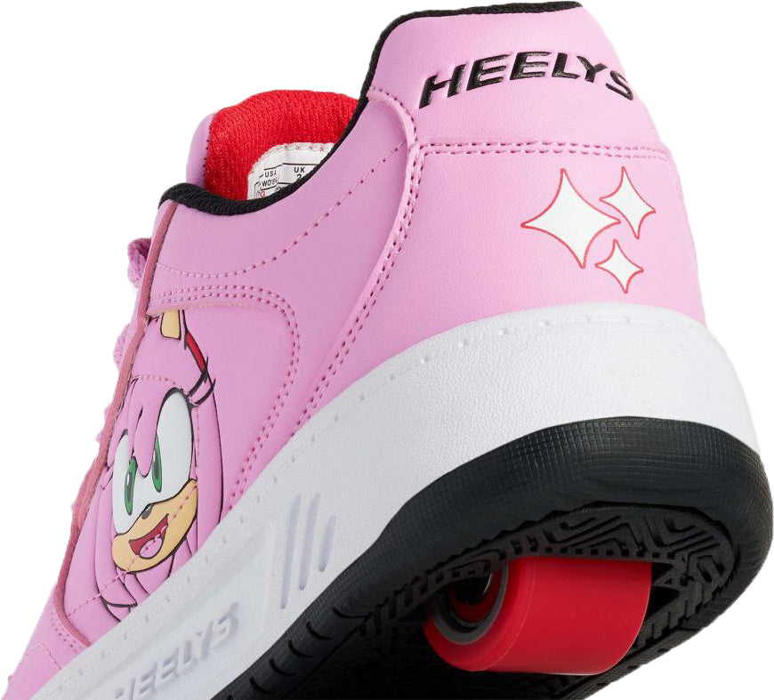 Heelys x Sonic Gio Girls Shoes in rose pink, black, and energy red, featuring an Amy Rose graphic on the side, a red heel wheel, and the brand name on the heel collar.