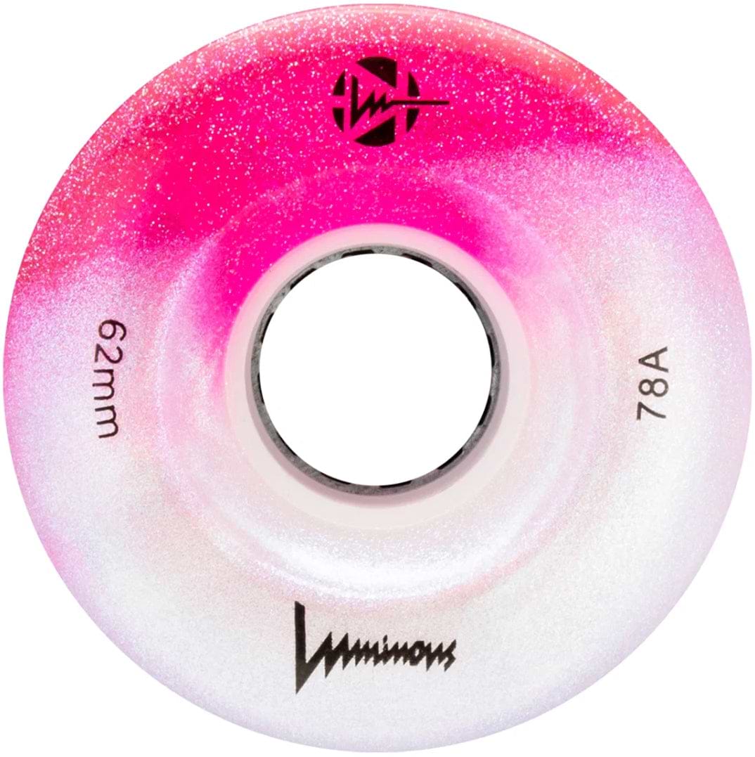 The Luminous LED 78A Quad Skate Wheel in Cotton Candy (62mm) features a pink and white glittery design, black Luminous logo near the center, and is perfect for outdoor quad skating.