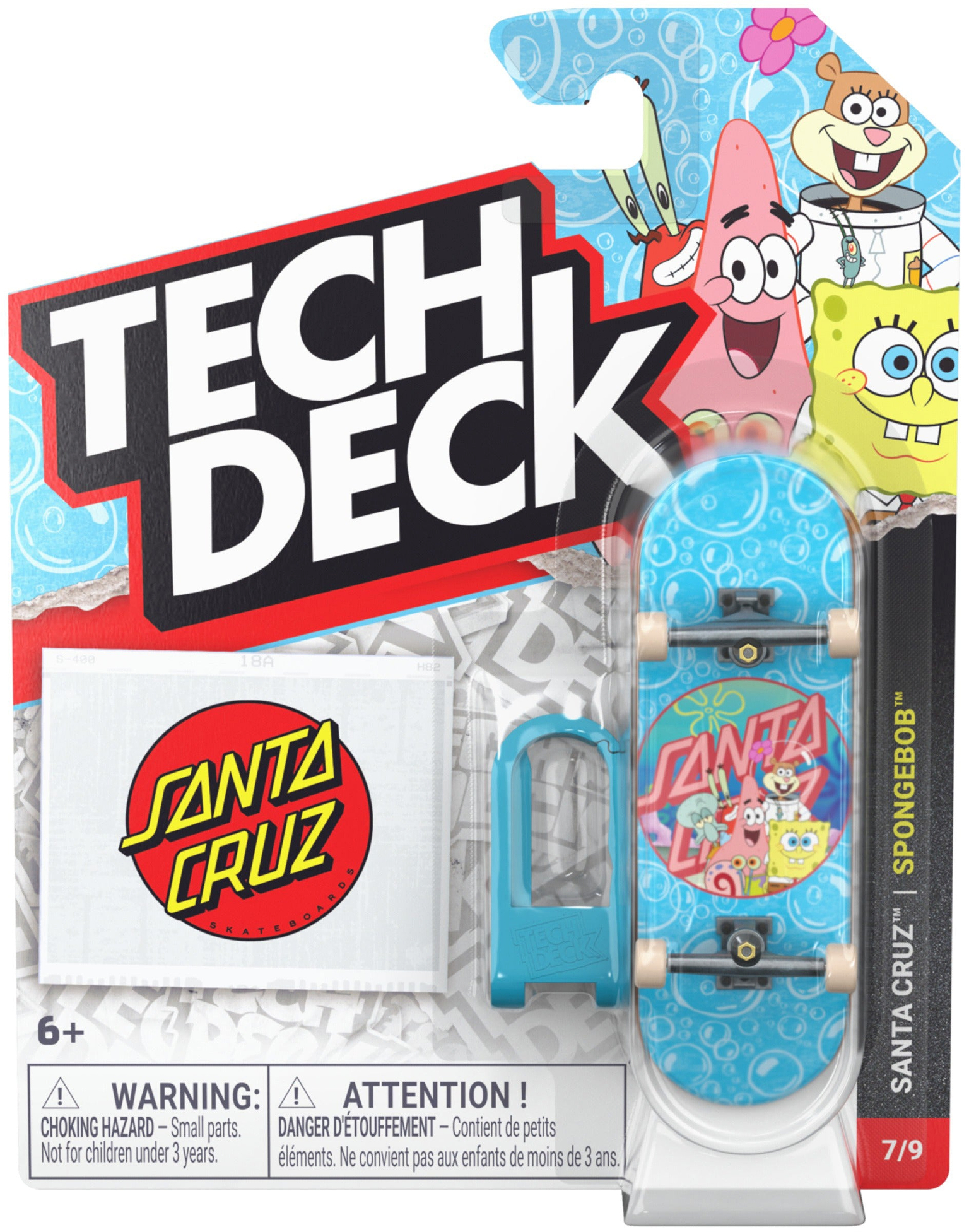The Tech Deck 96mm M04 Santa Cruz Fingerboard - Spongebob & Friends set by Tech Deck includes a collectible 96mm fingerboard featuring Spongebob graphics, a Santa Cruz skate ramp, and a blue skate tool. With Spongebob characters displayed on the packaging, this set is perfect for skateboard collectors ages 6 and up.