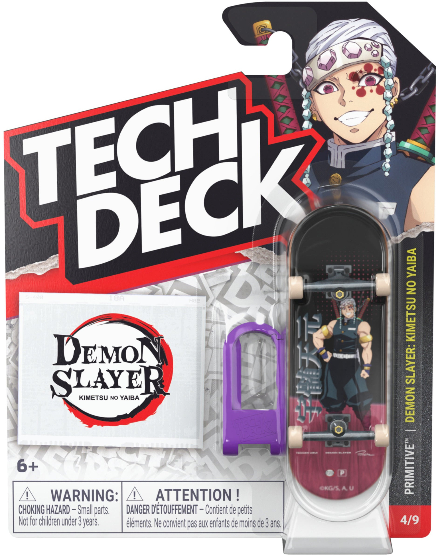 The Tech Deck 96mm M04 Primitive x Demon Slayer Fingerboard - Tengen Uzui showcases Demon Slayer’s Tengen Uzui on the packaging and includes a miniature 96mm fingerboard and a purple tool. Ideal for skateboard collectible enthusiasts, the packaging features Tech Deck branding and important safety warnings.