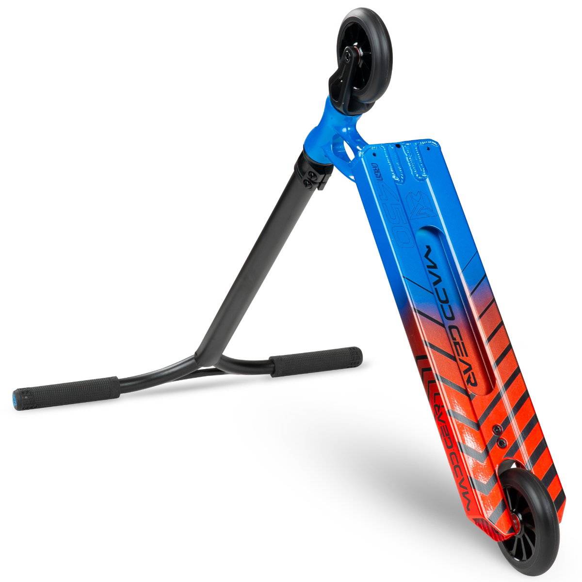 The Madd Gear MGP VX Origin IV 450 Complete Stunt Scooter - Tensor features a blue and red deck with black handlebars and a black front wheel, shown tilted upward. "Madd Gear" logo displayed—ideal for park riders.