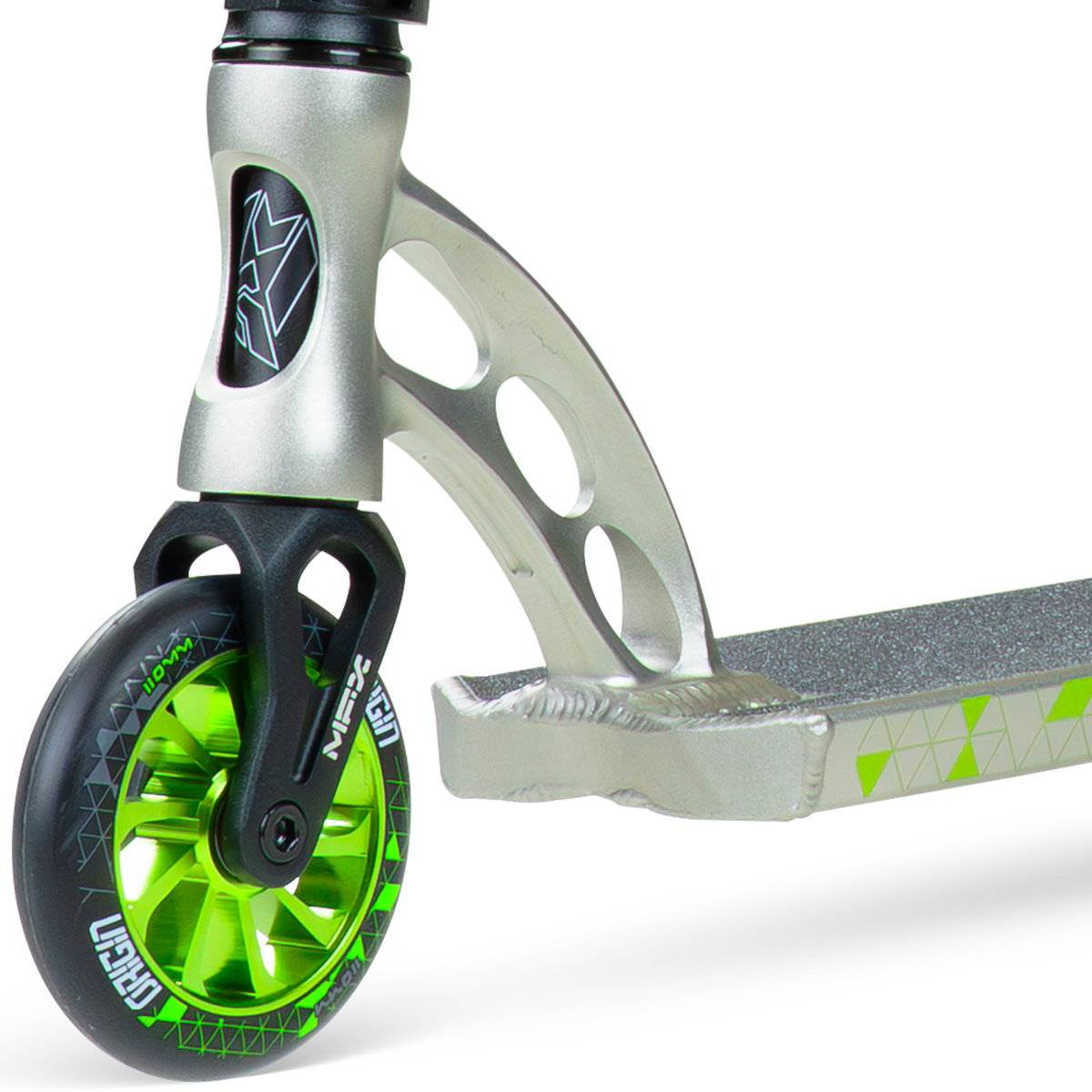 Close-up of the Madd Gear (MGP) VX Origin IV 500 Complete Stunt Scooter - Pyriform shows the detailed front wheel design, grip tape on the deck, and distinctive cutout patterns in both its fork and deck.