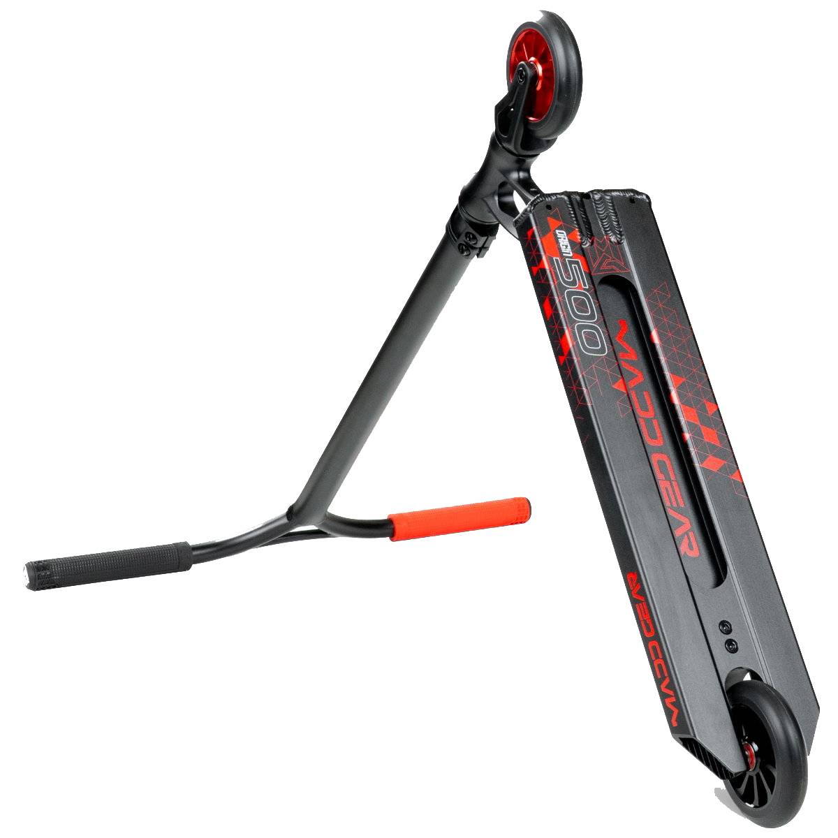 A black and red stunt scooter with one wheel raised, grips on the handlebars, and a deck labeled "Madd Gear" and "VX8 PRO," perfect for fans of the Madd Gear (MGP) VX Origin IV 500 Complete Stunt Scooter - Trigon or pro scooter enthusiasts.