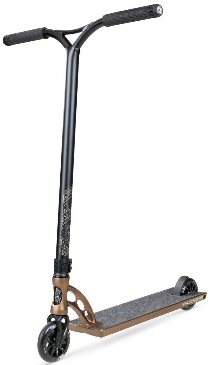 The Madd Gear MGP VX Origin IV 550 Complete Stunt Scooter in Antique Brass features black handlebars, a textured foot deck, and small black wheels—ideal for riders wanting a high-performance park scooter.