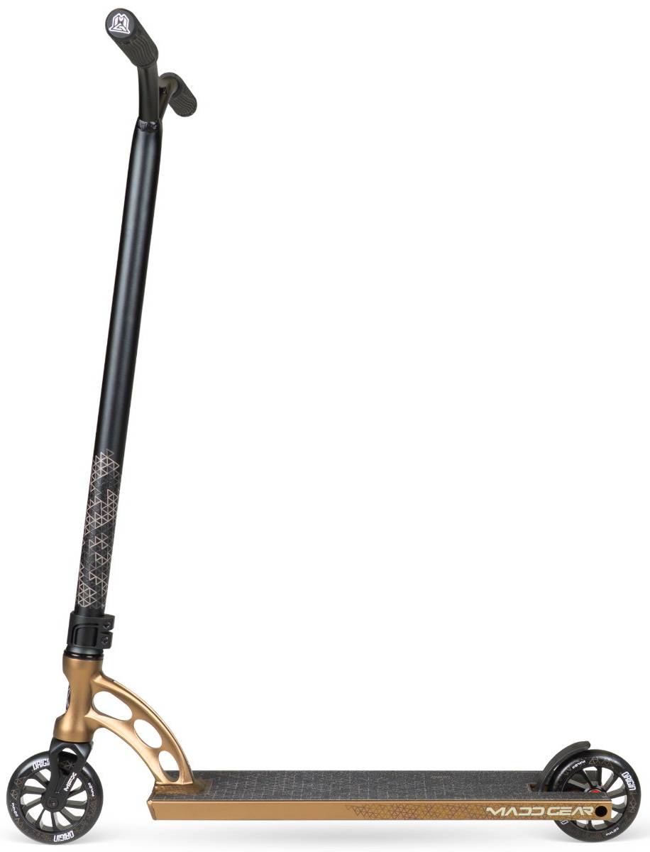 The Madd Gear (MGP) VX Origin IV 550 Complete Stunt Scooter in Antique Brass features a wide handlebar, sturdy deck, two large wheels, and "MADD GEAR" branding—ideal for park scooter enthusiasts.