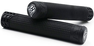 A pair of Madd Gear (MGP) MGP Trifecta Black Stunt Scooter Grips—each measuring 180mm, featuring a textured black TPR surface and distinctive white geometric logos on the end caps. One grip is positioned horizontally while the other rests angled on top, making them perfect as comfortable handlebar grips for your MGP Trifecta Stunt Scooter.