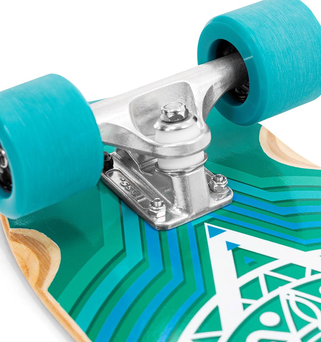 Close-up of the Mindless Drifter Cruiser Skateboard 28″ x 8″ - Teal’s blue wheel, silver truck, and green geometric deck detailing—ideal for stylish urban rides.
