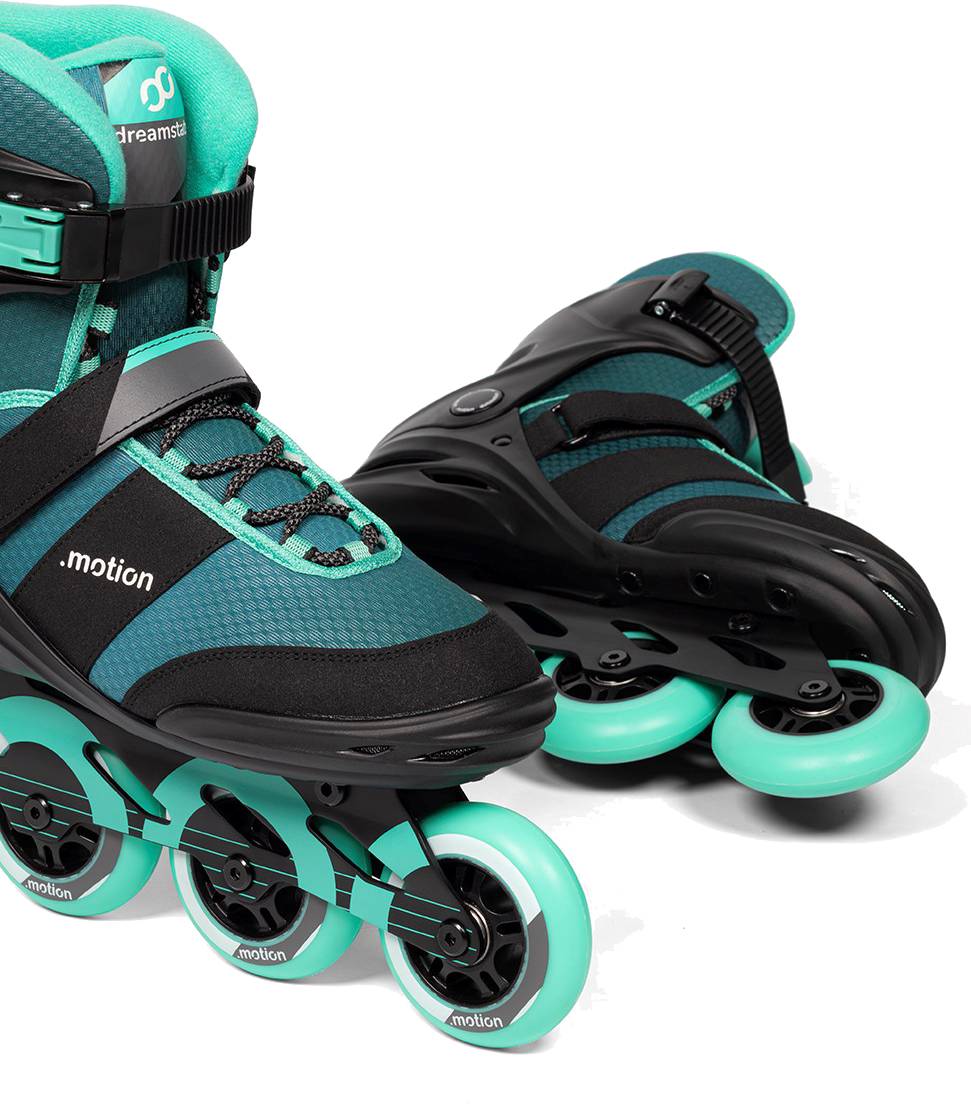 Pair of teal and black .motion Dreamstate Inline Skates featuring three 84mm wheels each.