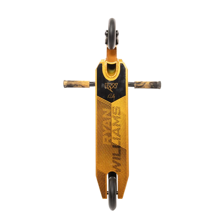 The Nitro Circus Ryan Williams Junior Replica 2025 Complete Stunt Scooter in gold and black is pictured vertically from above, showing its angular deck design and two side pegs, with one wheel at the top and one at the bottom.