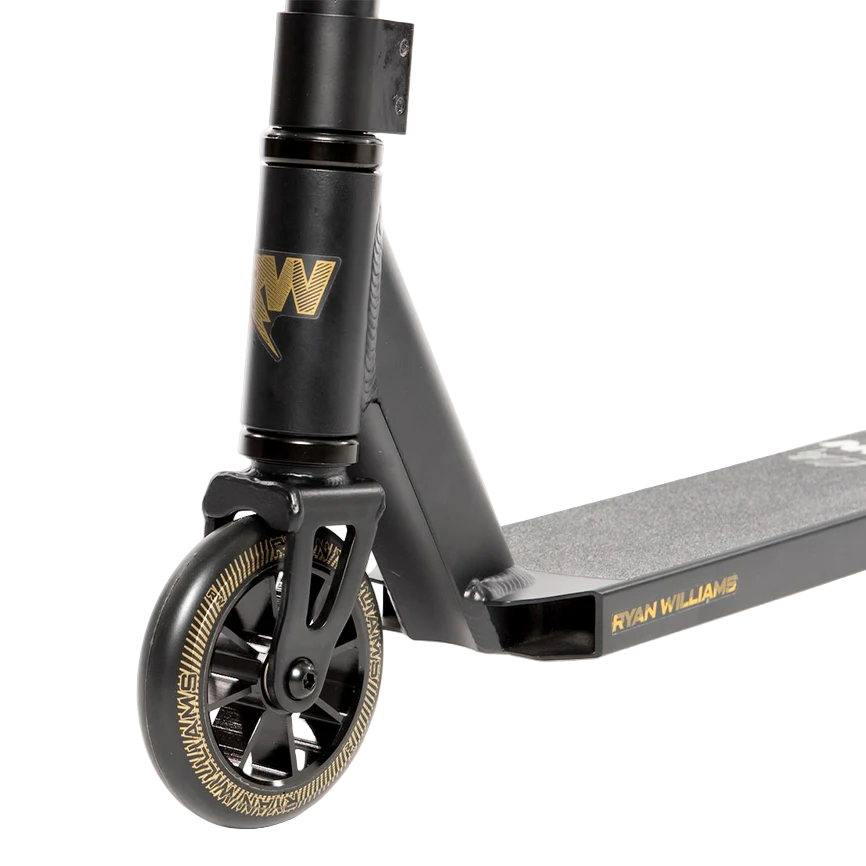 Close-up of the Nitro Circus Ryan Williams Signature Replica 2025 Complete Stunt Scooter in black, featuring gold accents and highlighting the wheel, fork, and "Ryan Williams" branding on the deck.