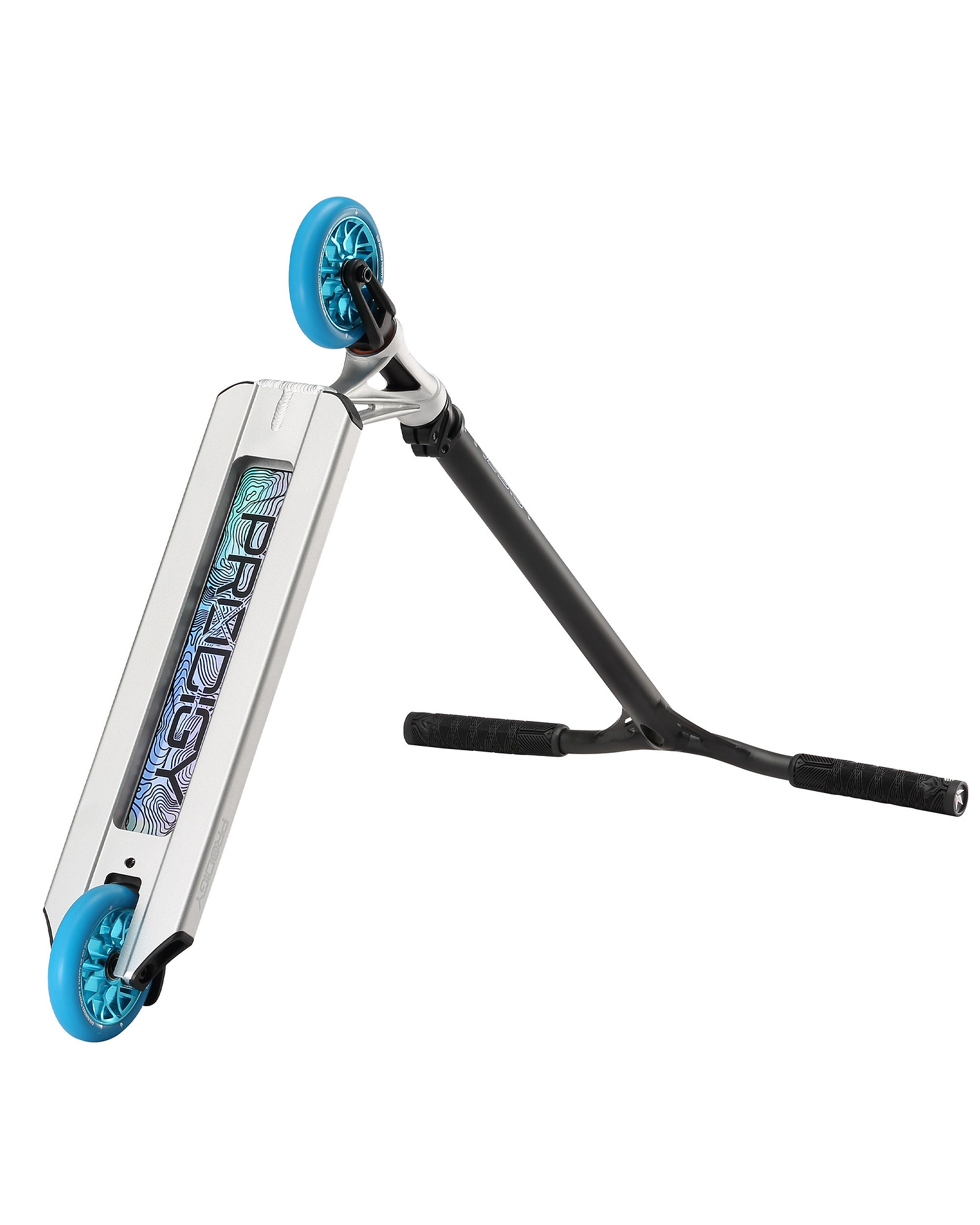 The Blunt Envy Prodigy X ONE Complete Stunt Scooter in silver features blue wheels, black handlebars, and an iridescent "Prodigy" logo on its deck, shown lying on its side with the handlebars resting on the ground.