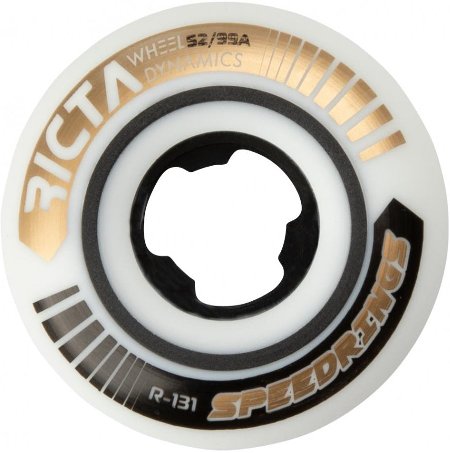 Ricta Speedrings Slim 52mm 99A Skateboard Wheels in white feature gold, black, and grey graphics with the labels “SPEEDRINGS,” “DYNAMICS,” and “WHEELS 52/99A.” These wheels from Ricta have a geometric-patterned inner core for added performance.