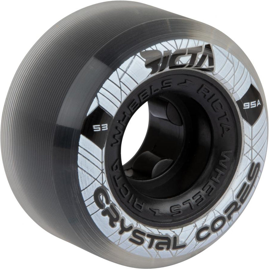 A close-up of a translucent skateboard wheel labeled “Ricta Crystal Cores,” made from clear urethane with a white and silver core design, displaying “53mm 95A” and “53” markings. The product shown is the Ricta Crystal Cores 53mm 95A Skateboard Wheel in Black / Clear by Ricta.