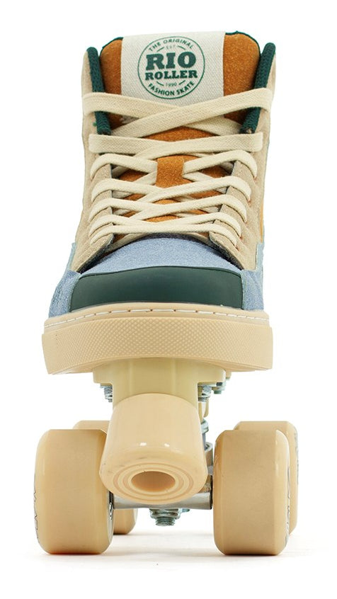 A close-up, front view of the Rio Roller Beats Quad Roller Skates in Blue/Tan, featuring beige wheels, cream laces, multicolored suede boots, and the Rio Roller logo—vegan-friendly skates ideal for retro fans.