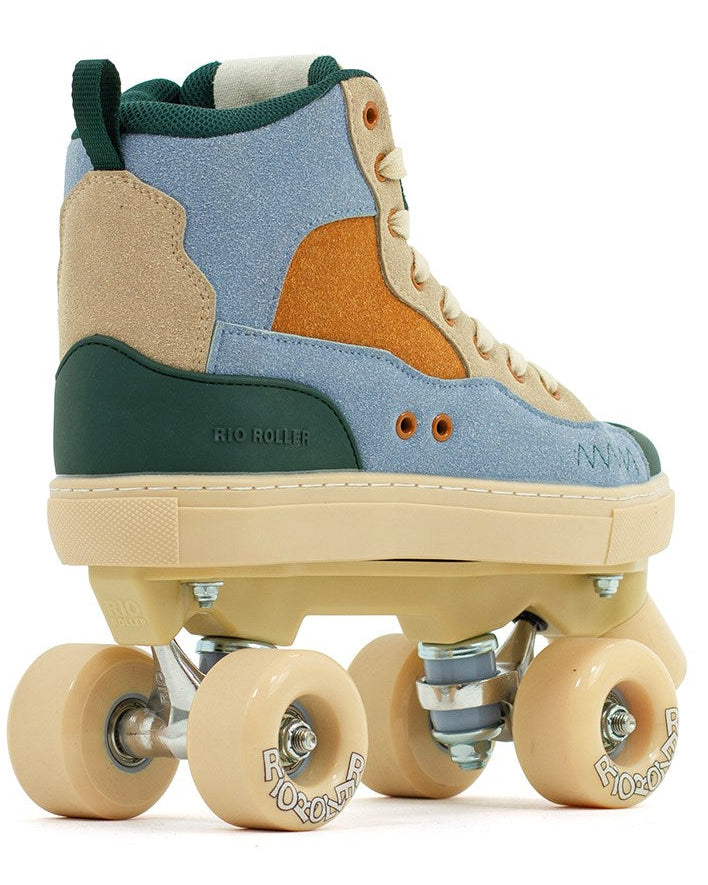 The Rio Roller Beats Quad Roller Skates - Blue / Tan by Rio Roller are retro-style, vegan-friendly high-tops with beige laces and sole, four cream wheels, and metal trucks—perfect for roller skate enthusiasts seeking a classic design.