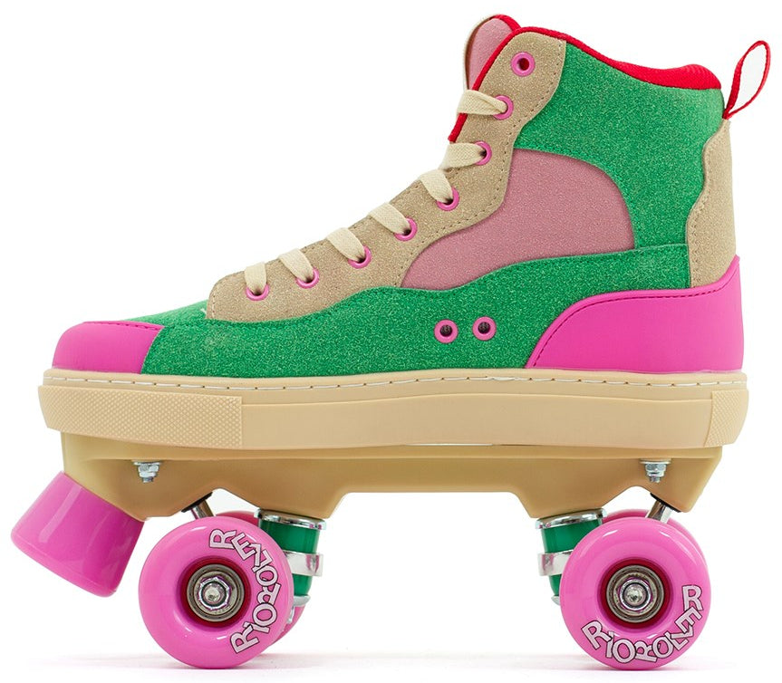 The Rio Roller Beats Quad Roller Skates in Pink/Green by Rio Roller feature a vegan high-top sneaker design with a green and pink upper, tan details, pink wheels, and a beige sole for stylish, sustainable skating.