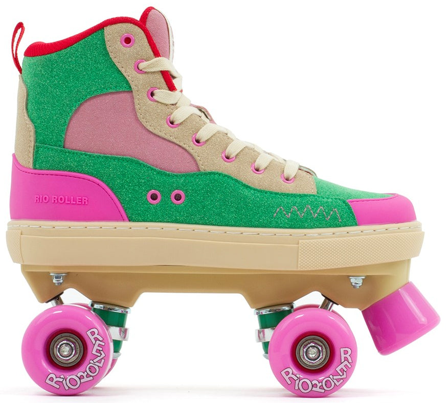 The Rio Roller Beats Quad Roller Skates by Rio Roller feature a vegan high-top boot in green, pink, beige, and red with durable beige laces, pink "Rio Roller" wheels, and a sturdy beige sole.
