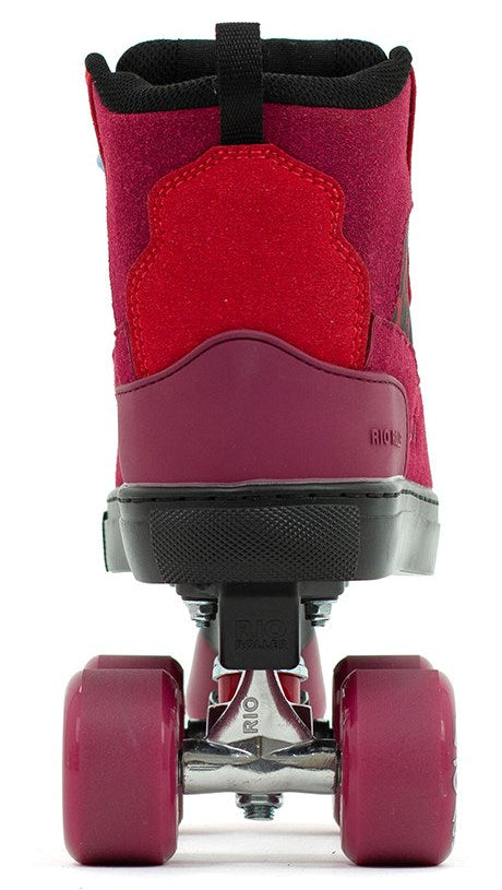 A close-up rear view of the Rio Roller Beats Quad Roller Skates in red/leopard by Rio Roller, featuring pink wheels, black accents, visible metal hardware, and a vegan-friendly design.