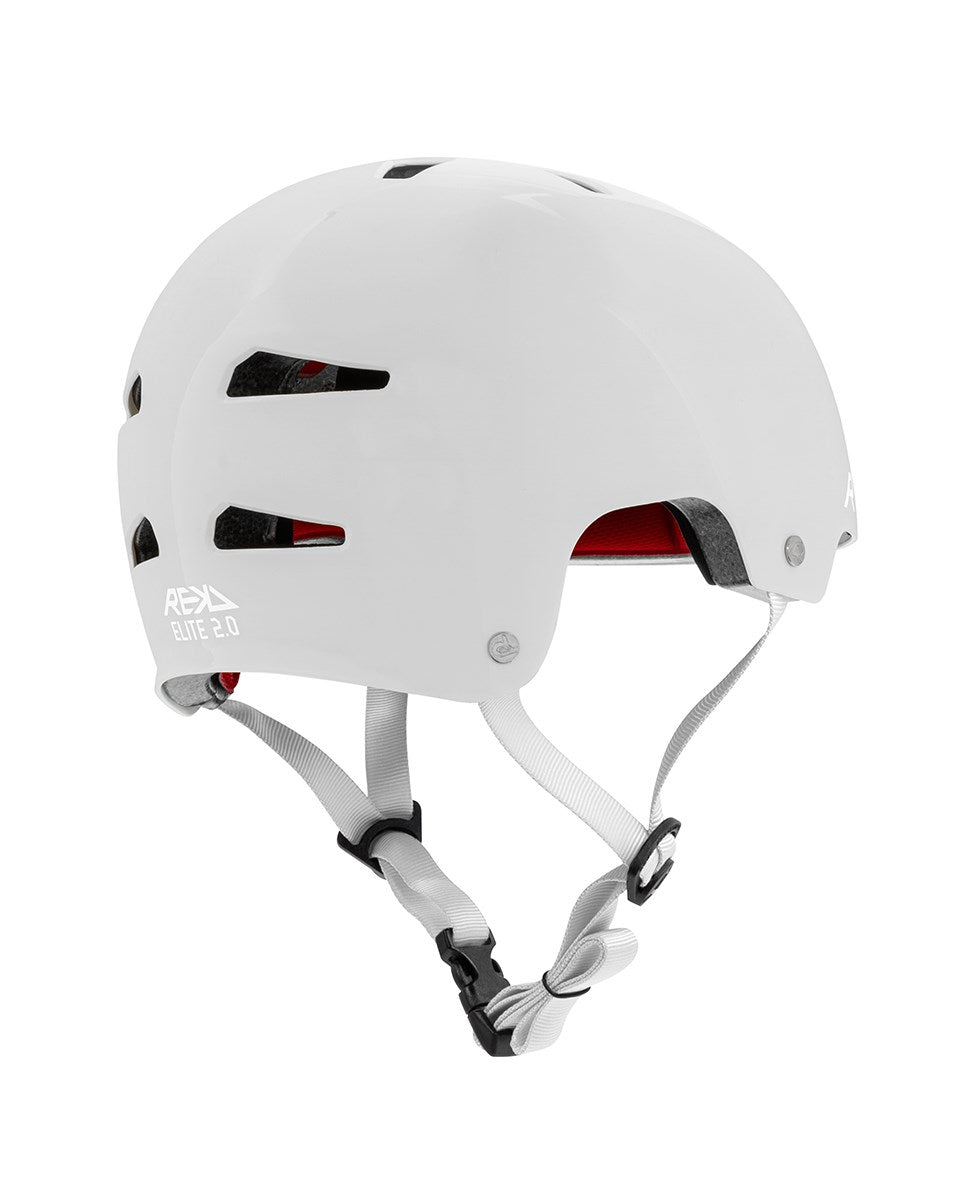 The REKD Elite 2.0 Skate / Scooter Helmet in Gloss Silver is a lightweight helmet with black ventilation slits, red interior lining, and an adjustable gray chin strap with a black buckle—perfect for action sports protection.