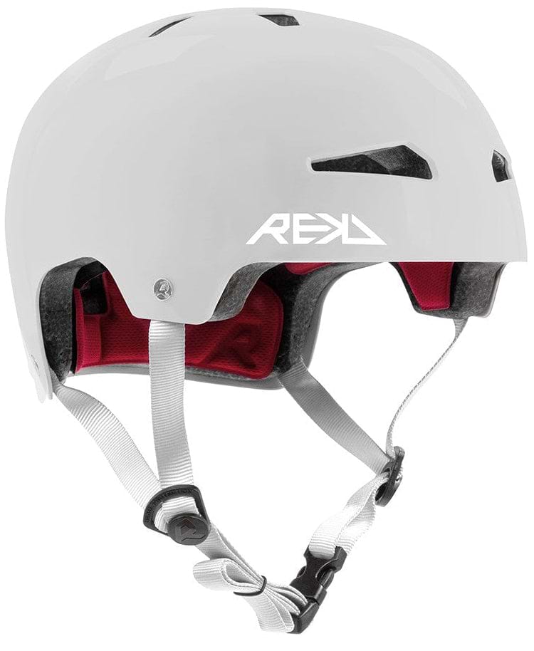The REKD Elite 2.0 Skate / Scooter Helmet in Gloss Silver is a lightweight, certified action sports helmet with ventilation holes, red padding, a white adjustable chin strap, and the REKD logo on the side.