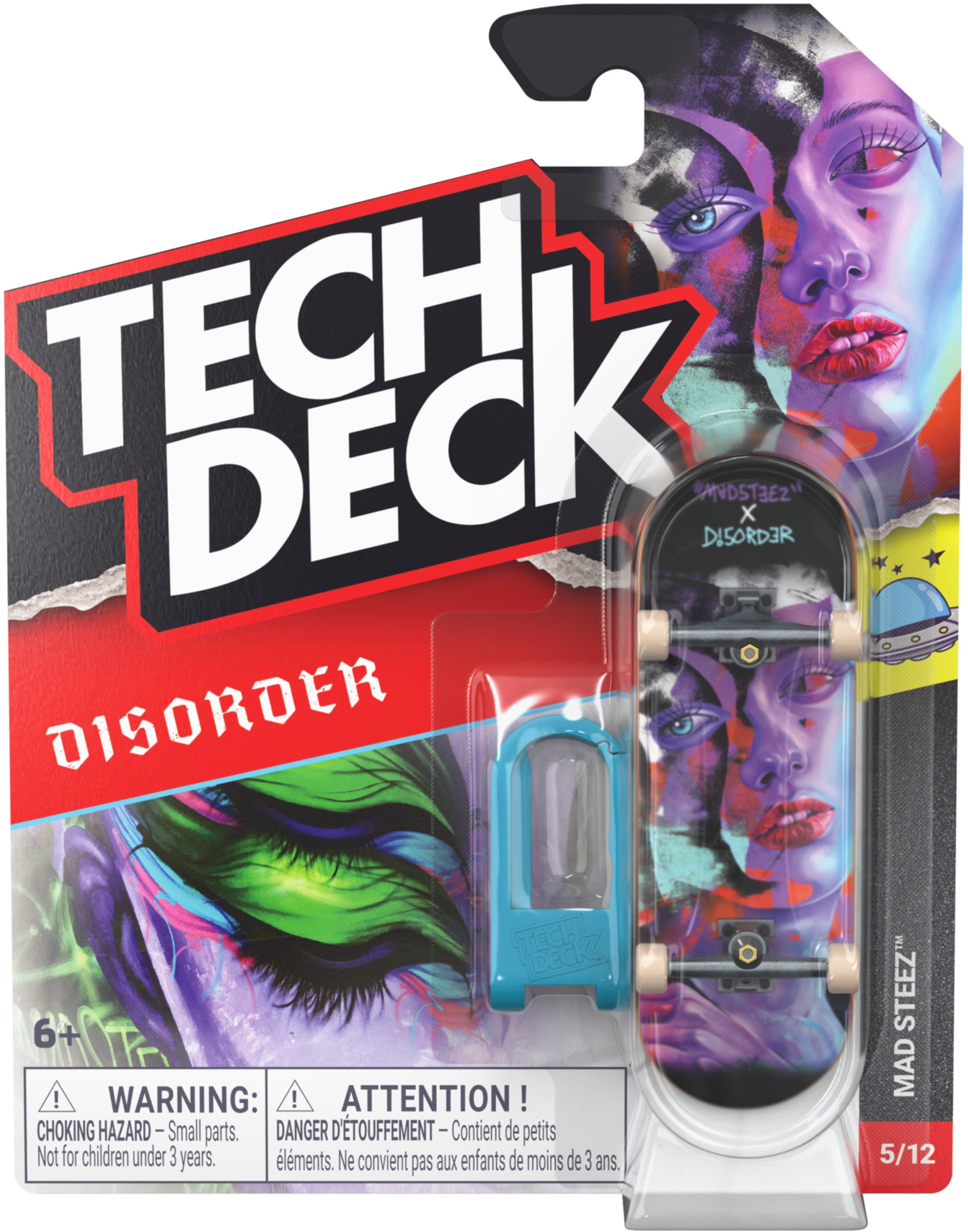 A Tech Deck 96mm M61 Fingerboard - Disorder featuring an illustrated face graphic, displayed in its original retail packaging with a plastic tool.