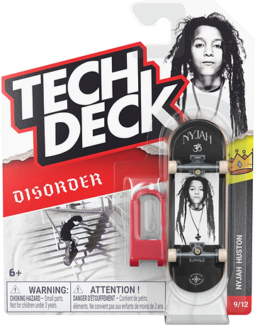 A Tech Deck 96mm M61 Fingerboard - Disorder Nyjah Huston featuring a black-and-white portrait of a skateboarder, packaged with a small red plastic tool on a blister card.
