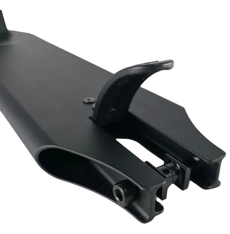 A close-up of the Union Classic Pro Black Stunt Scooter Deck - 5" by Union, featuring an integrated foot brake and wheel mount opening—perfect for park riders seeking performance and style, set against a white background.