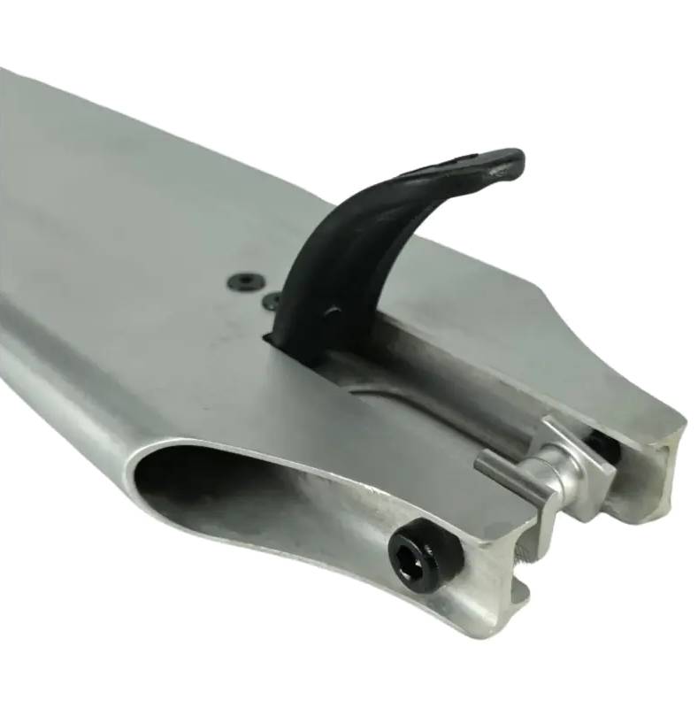 Close-up of the Union Classic Pro Silver Stunt Scooter Deck - 5" by Union, a lightweight silver deck with a black rear brake and hollow design—ideal for tricks and park riding as a pro stunt scooter deck.